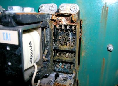 Corroded elevator relay caused by water leak.